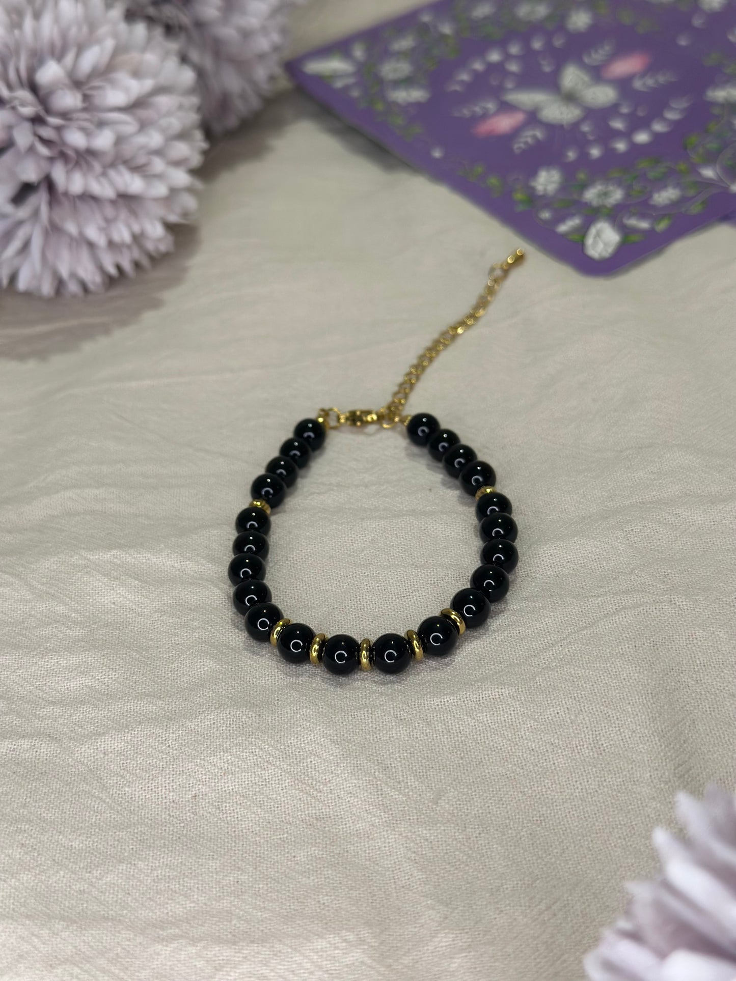 Bracelet Eira doré Onyx | Force & Stabilité