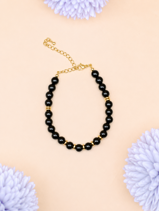 Bracelet Eira doré Onyx | Force & Stabilité