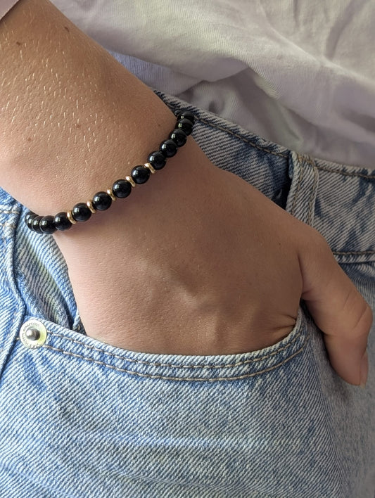 Bracelet Eira doré Onyx | Force & Stabilité